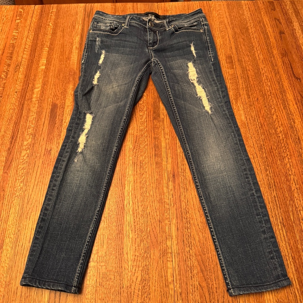 BEBE Moondancer Distressed Skinny Jeans. Size 29, missing one back button